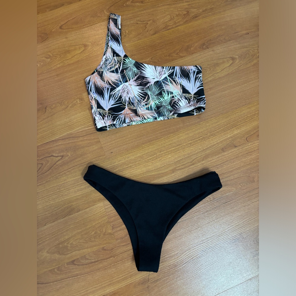 JUNE SWIMWEAR Tropical Off Shoulder Top and Cheeky Black Bikini Bottoms